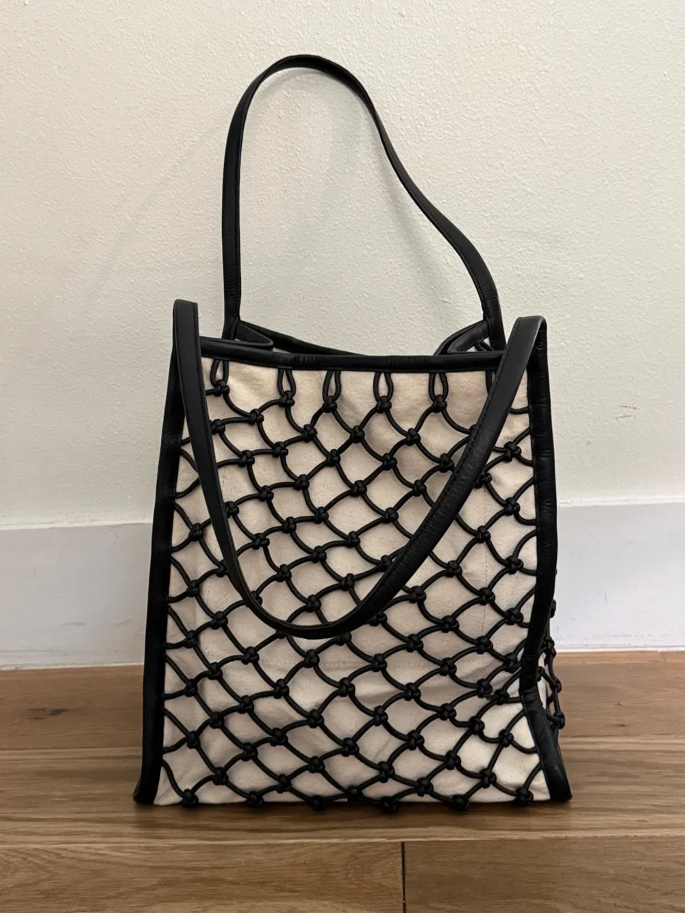 Madewell Black Knotted Leather Net Tote over Cream Canvas